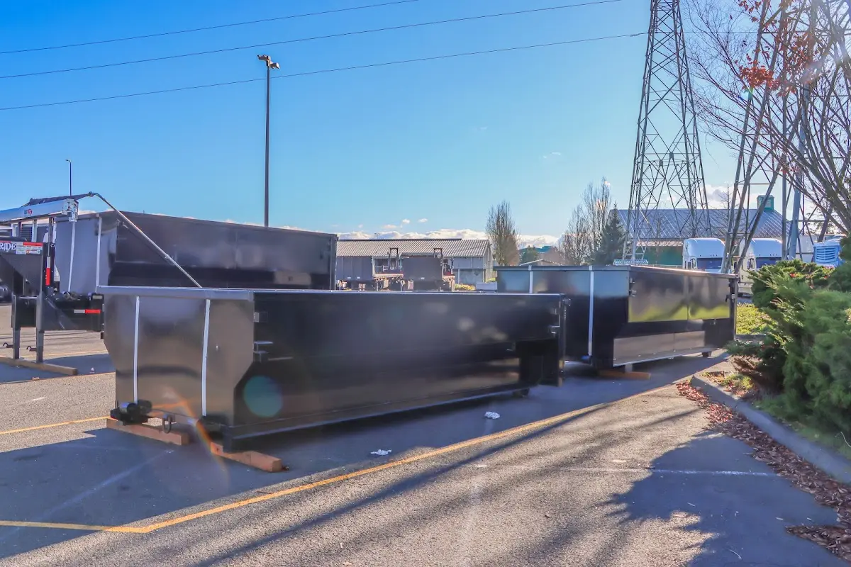 Roll-off dumpster ready for waste disposal at job site for Concrete Dumpster Rental in Harrison